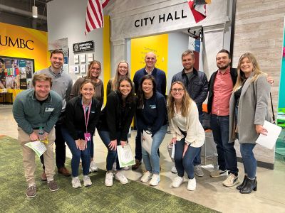 Group of volunteers pose for a picture in JA BizTown